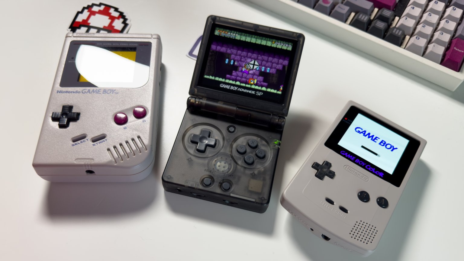 RG35XX SP with Game Boy DMG and Game Boy Color OLED