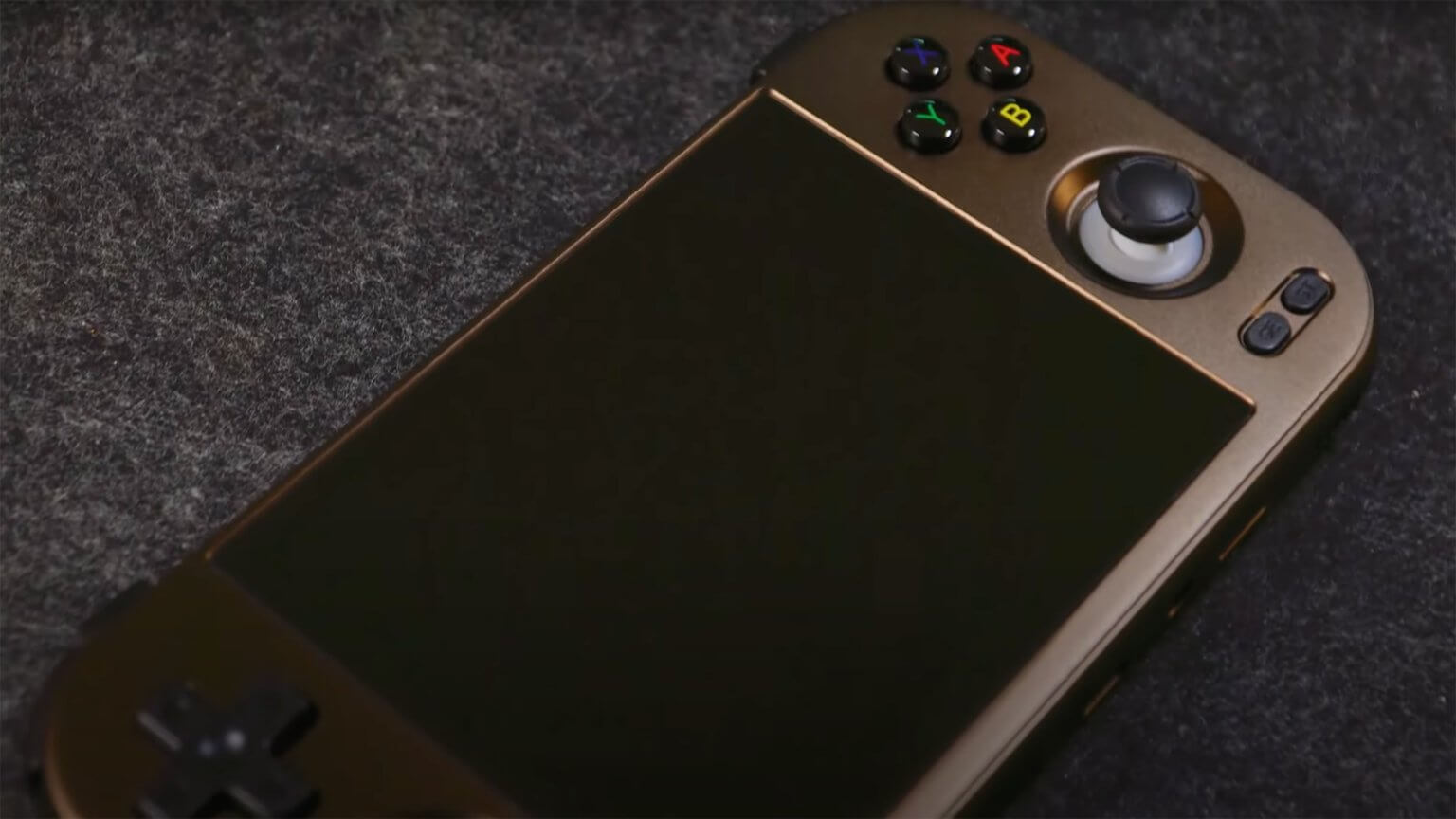 Anbernic RG477M in bronze - front