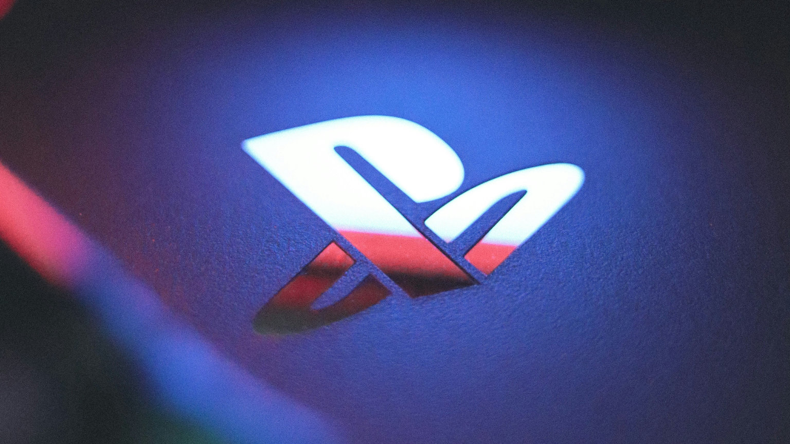PlayStation Logo Light Reflection - Unsplash | Retro Handhelds PlayStation Logo Light Reflection - Unsplash