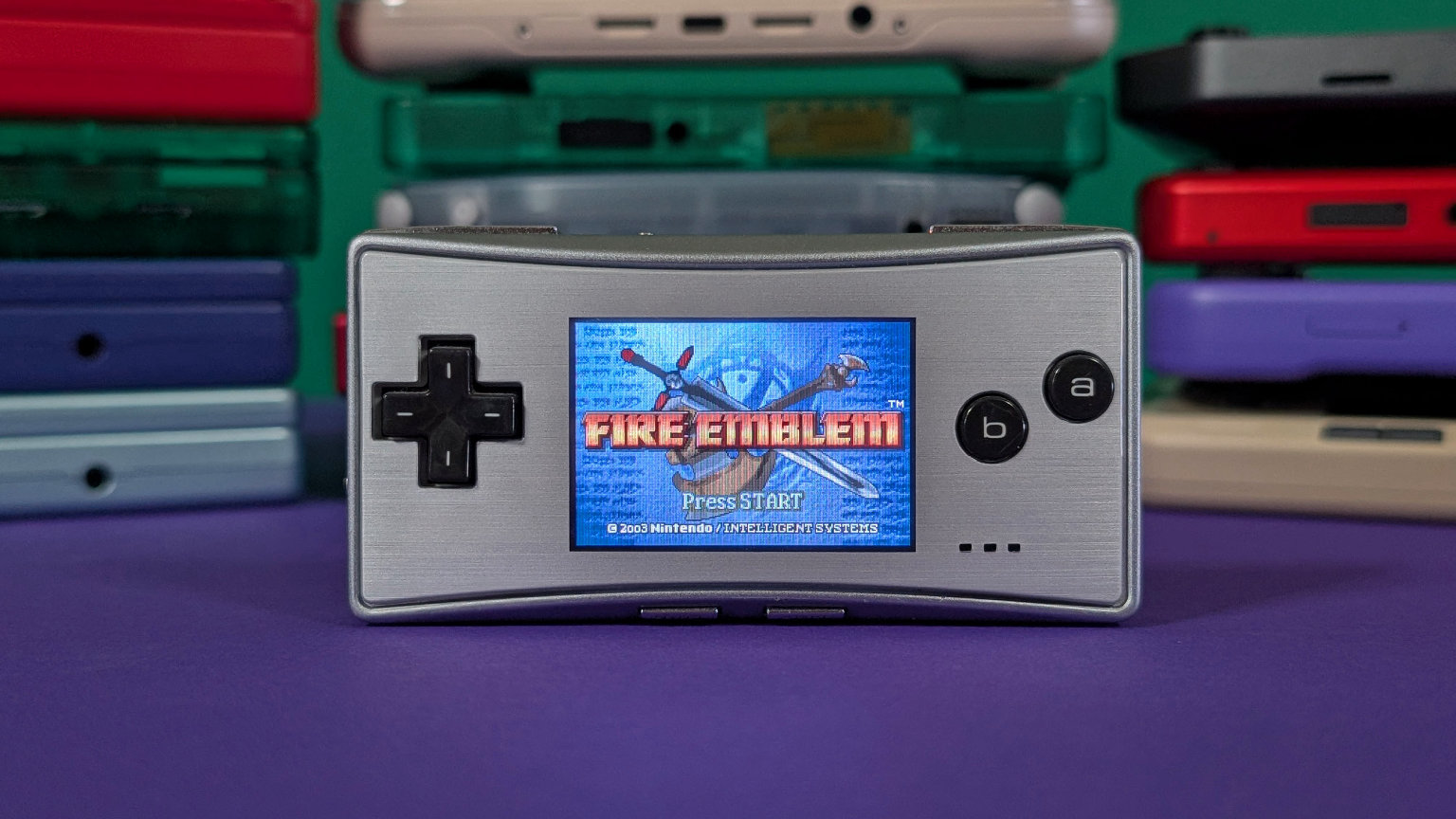 Gameboy Micro in front of Handheld Stacks | Retro Handhelds Gameboy Micro in front of Handheld Stacks