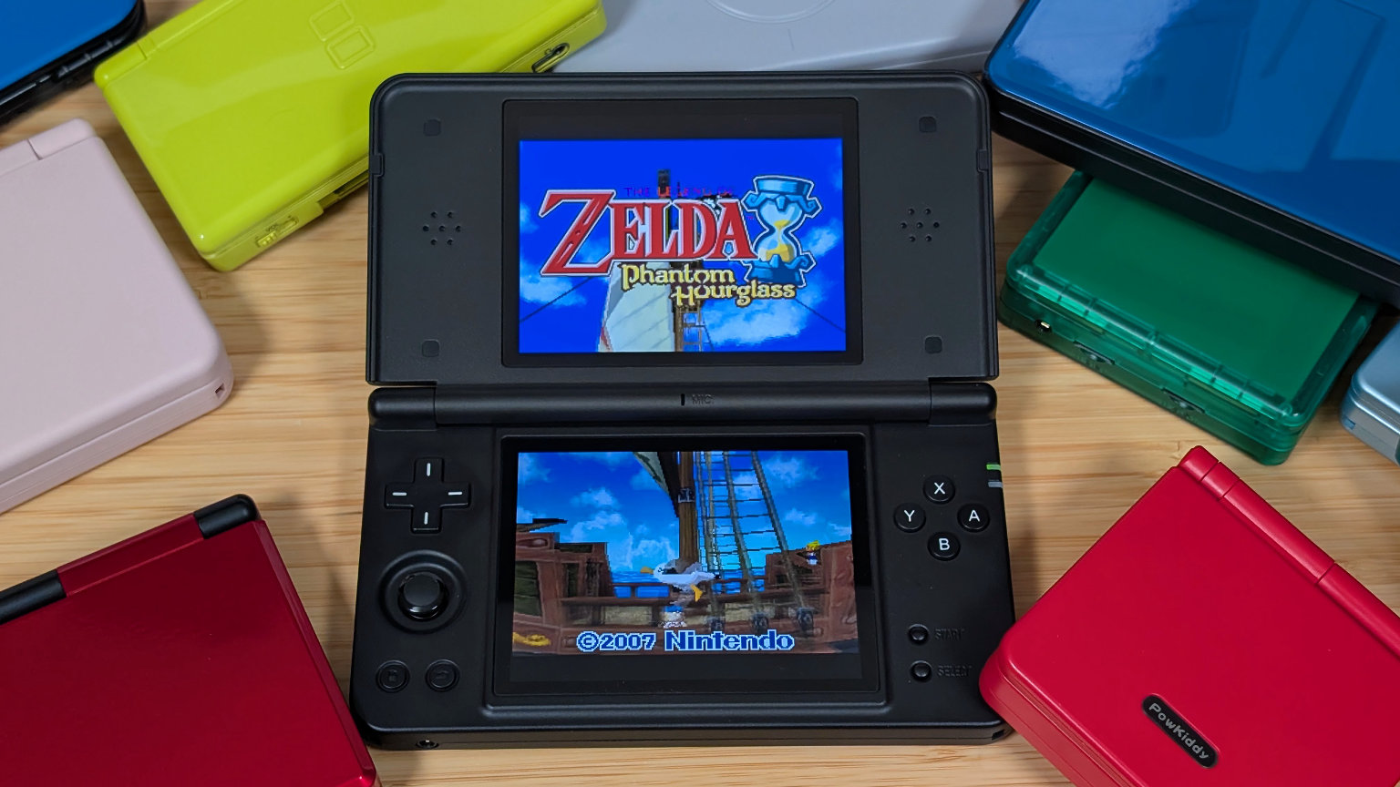RG DS Plus Surrounded by Clamshells | Retro Handhelds RG DS Plus Surrounded by Clamshells